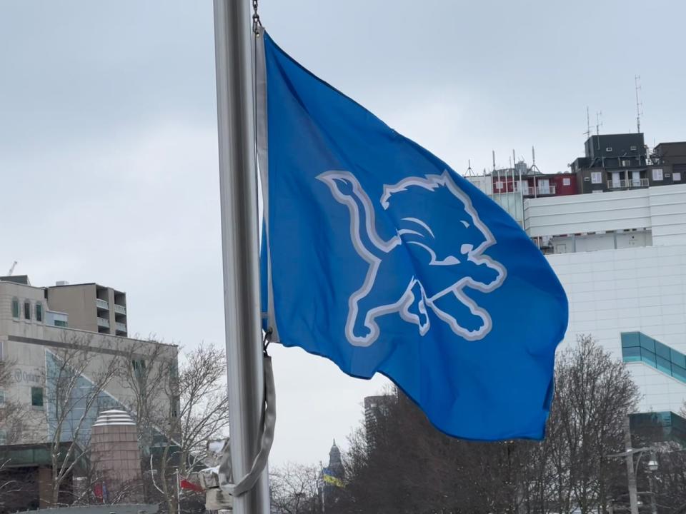 The flag of the Detroit Lions flies at Windsor City Hall on Jan. 18, 2024.