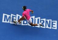 Rafael Nadal of Spain runs to hit a return to Tomas Berdych of the Czech Republic during their men's singles quarter-final match at the Australian Open 2015 tennis tournament in Melbourne January 27, 2015. REUTERS/Carlos Barria