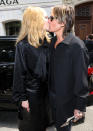 <p>Nicole Kidman and Keith Urban share a smooch outside of the Balenciaga show at Paris Fashion Week on July 6. </p>