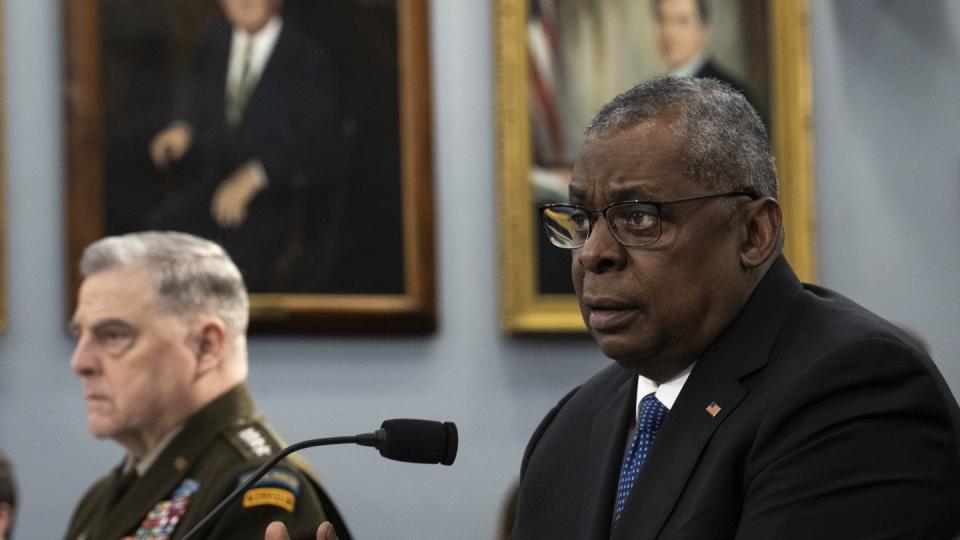 From left, Chairman of the Joint Chiefs of Staff Gen. Mark Milley and U.S. Defense Secretary Lloyd Austin testify during a hearing on Capitol Hill on March 23, 2023. The military leaders spoke about the Defense Department's fiscal 2024 budget request. (Drew Angerer/Getty Images)