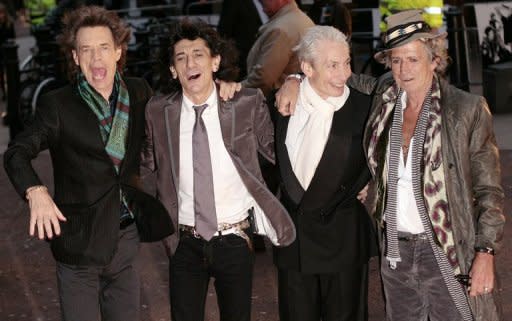 British rock band the Rolling Stones (L to R) Mick Jagger, Ronnie Wood, Charlie Watts, and Keith Richards in London in 2008. Most London shoppers rush by 165 Oxford Street without a second glance -- but it was there 50 years ago that The Rolling Stones played their first gig and changed the landscape of pop music forever