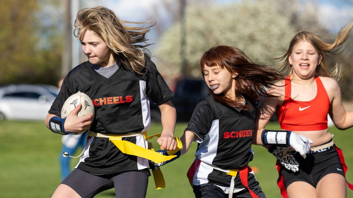 Lauren Ruhter, left, runs the ball during practice April 17 at Settlers Park in Meridian. Sarah A. Miller/smiller@idahostatesman.com