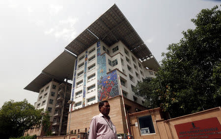 A man walks past the Ministry of Environment, Forest and Climate Change in New Delhi, May 17, 2018. Picture taken May 17, 2018. REUTERS/Adnan Abidi