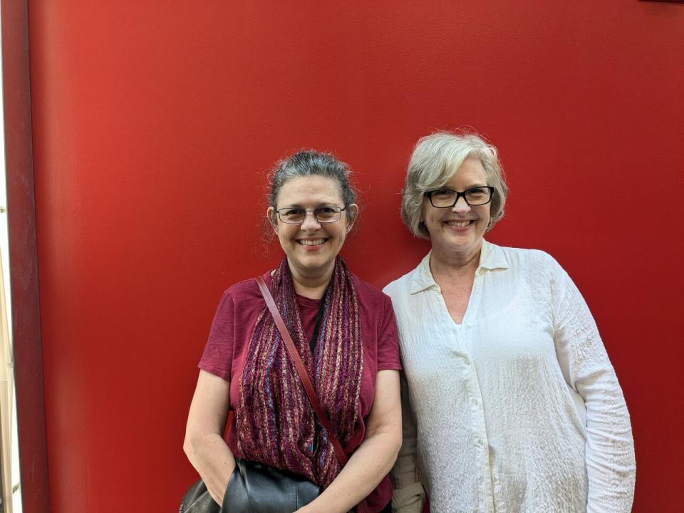 L.R. Wright's daughters, Katey (left) and Johnna (right), are pictured at CBC Vancouver on Sept. 24, 2024.