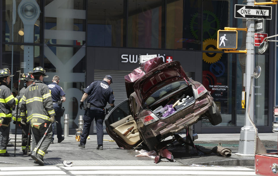 <p>Emergency workers at the scene after multiple people were injured when a vehicle struck numerous pedestrians in Times Square in New York City, New York, USA, 18 May 2017. Reports indicated that the vehicle was possibly speeding when it drove up onto the sidewalk striking the pedestrians. (Justin Lane/EPA) </p>