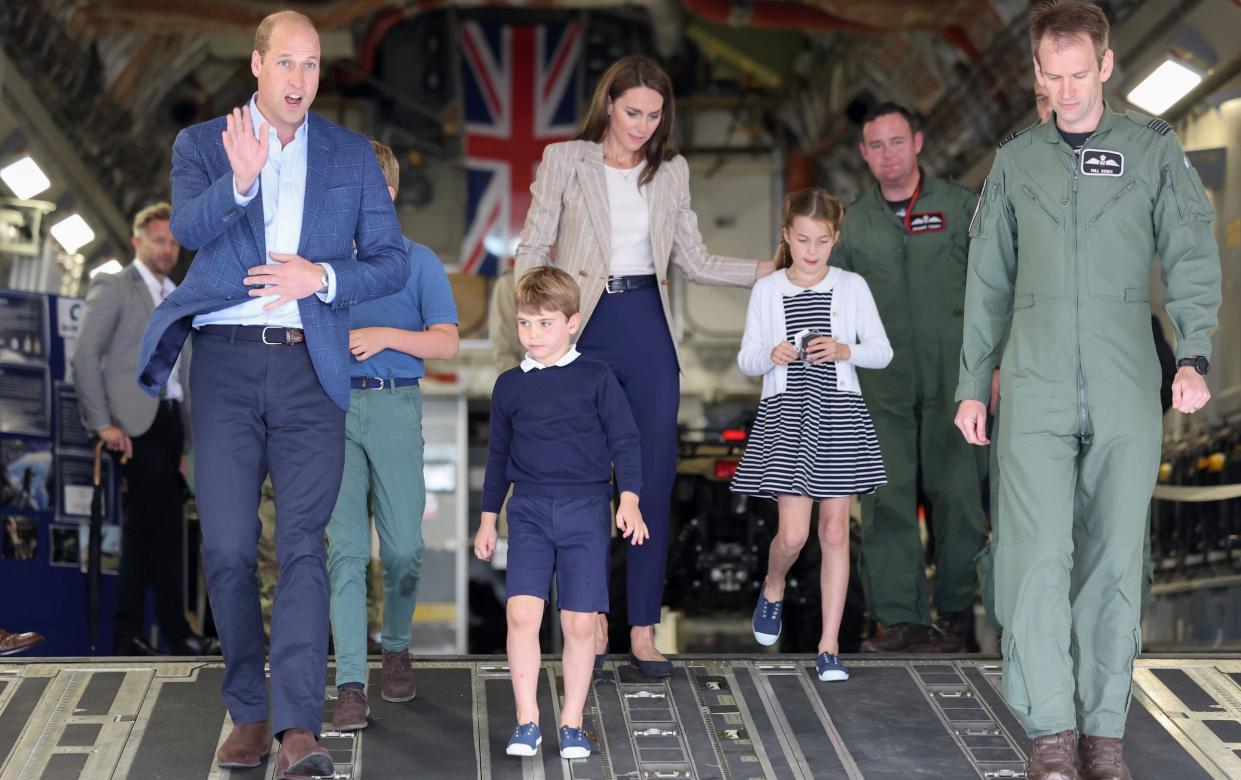 Prince Louis and Princess Charlotte in blue Hampton Canvas plimsolls