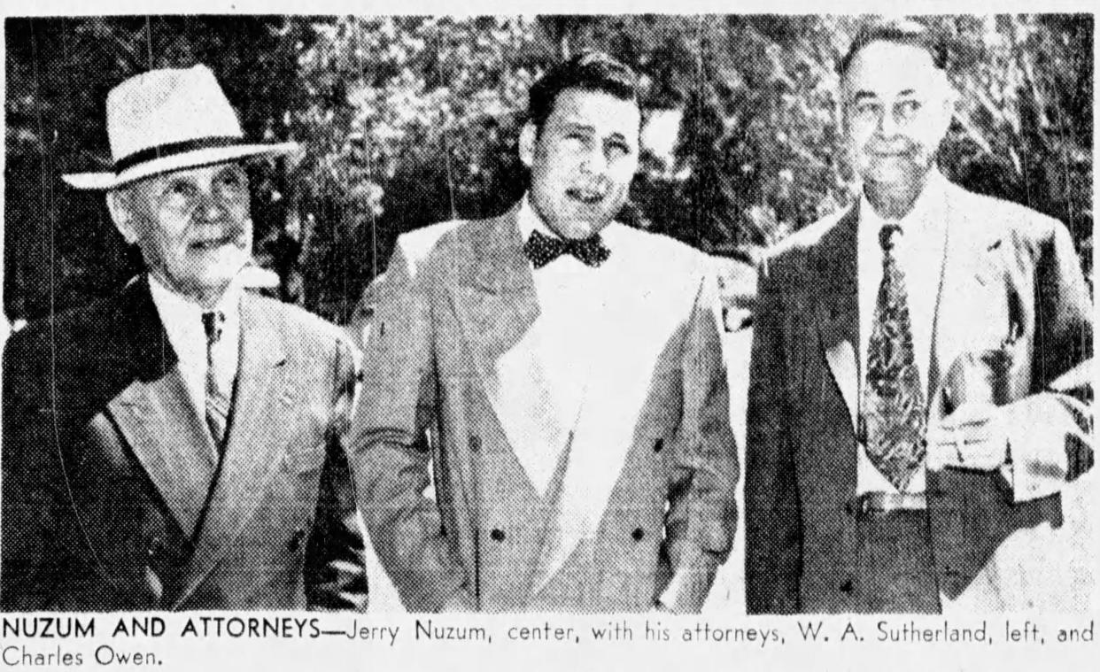 Mayb11, 1951: Jerry Nuzum, center, with his attorneys, W. A. Sutherland, left, and Charles Owen.