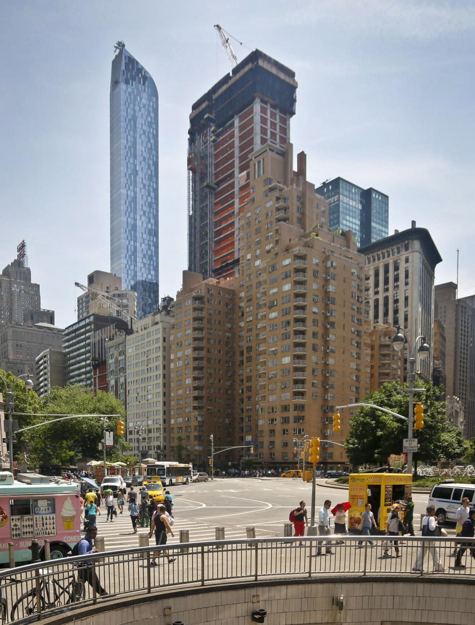 FILE- In this May 26, 2016 file photo, a crane sits atop ongoing construction for a new condominium skyscraper at 220 Central Park South in New York. Citadel hedge fund founder Ken Griffin, a billionaire hedge fund founder, has purchased a penthouse in New York for roughly $238 million. The Wall Street Journal reported Wednesday, Jan. 23, 2019, that the deal sets a record for the highest-priced home ever sold in the U.S. (AP Photo/Bebeto Matthews, File)