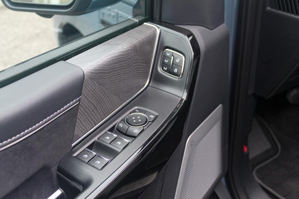 The window switches and leather trim in the 2023 Ford F-150 Lightning Platinum.
