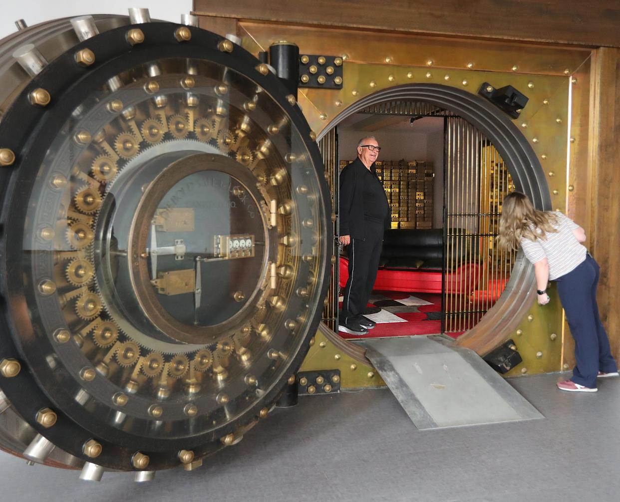 159 S. Main Street owner Tom Rybak shows off a former bank vault at the building.