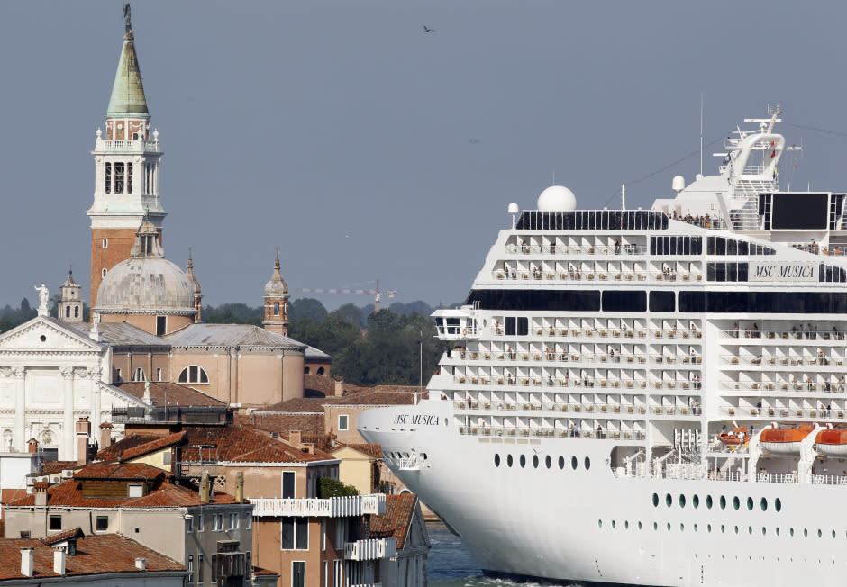 The MSC Musica cruise ship is seen in Venice lagoon June 17, 2012. Since the wreck of the Costa Concordia in January, environmentalists have stepped their efforts to have large cruise ships banned from the lagoon which surrounds the historic centre of the canal city. REUTERS/Stefano Rellandini