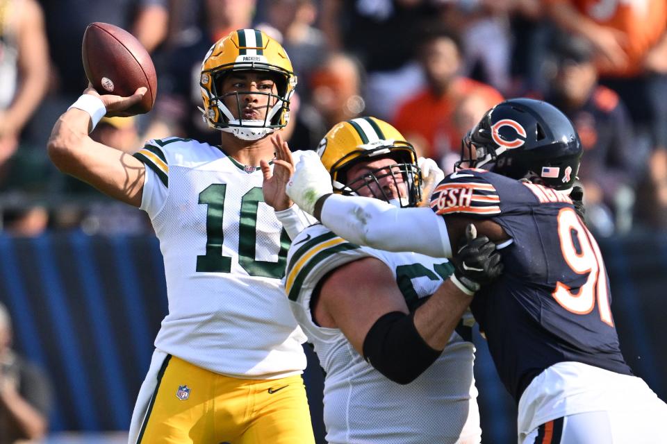 Green Bay Packers quarterback Jordan Love (10) passes in the first half against the Chicago Bears.