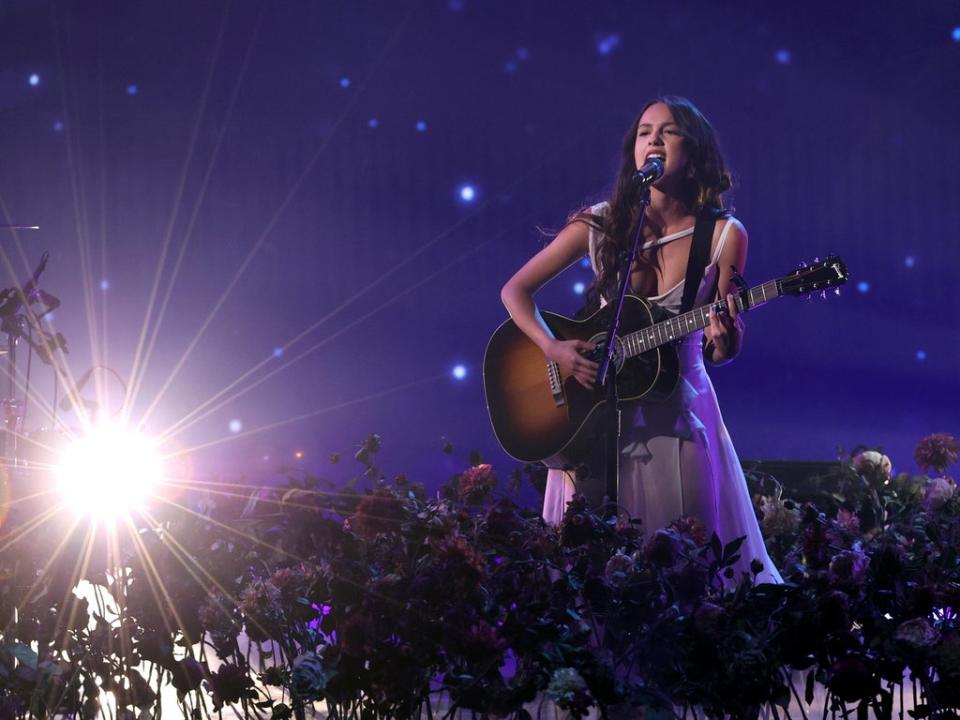 Olivia Rodrigo performing onstage during the 2021 American Music Awards. (Getty Images for MRC)