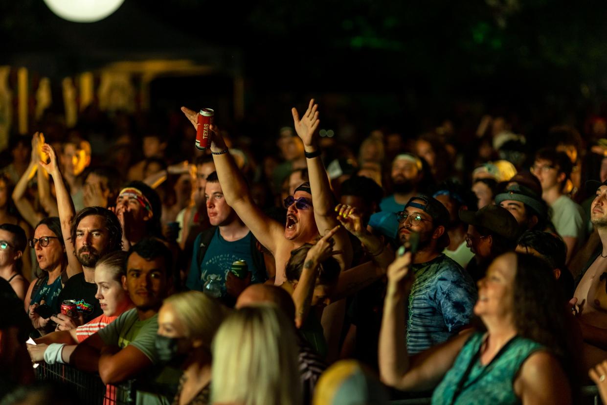 Music fans react to Mobley at a Blues on the Green concert in 2021. The popular free music series will return for two dates in July.