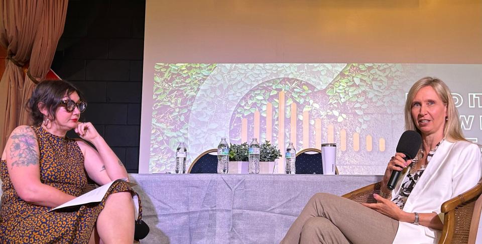 Savannah-Chatham School Board forum moderator Coco Guthrie-Papy (left), from Deep Center, listens as District 1 incumbent Denise Grabowski answers a question on Sunday May 19, 2024 at Front Porch Improv.