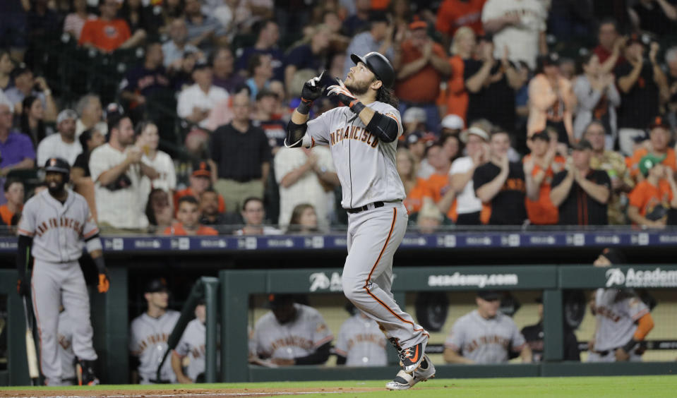 Brandon Crawford hit a home run off his brother-in-law Gerrit Cole Tuesday while his sister watched awkwardly from the stands. (AP)