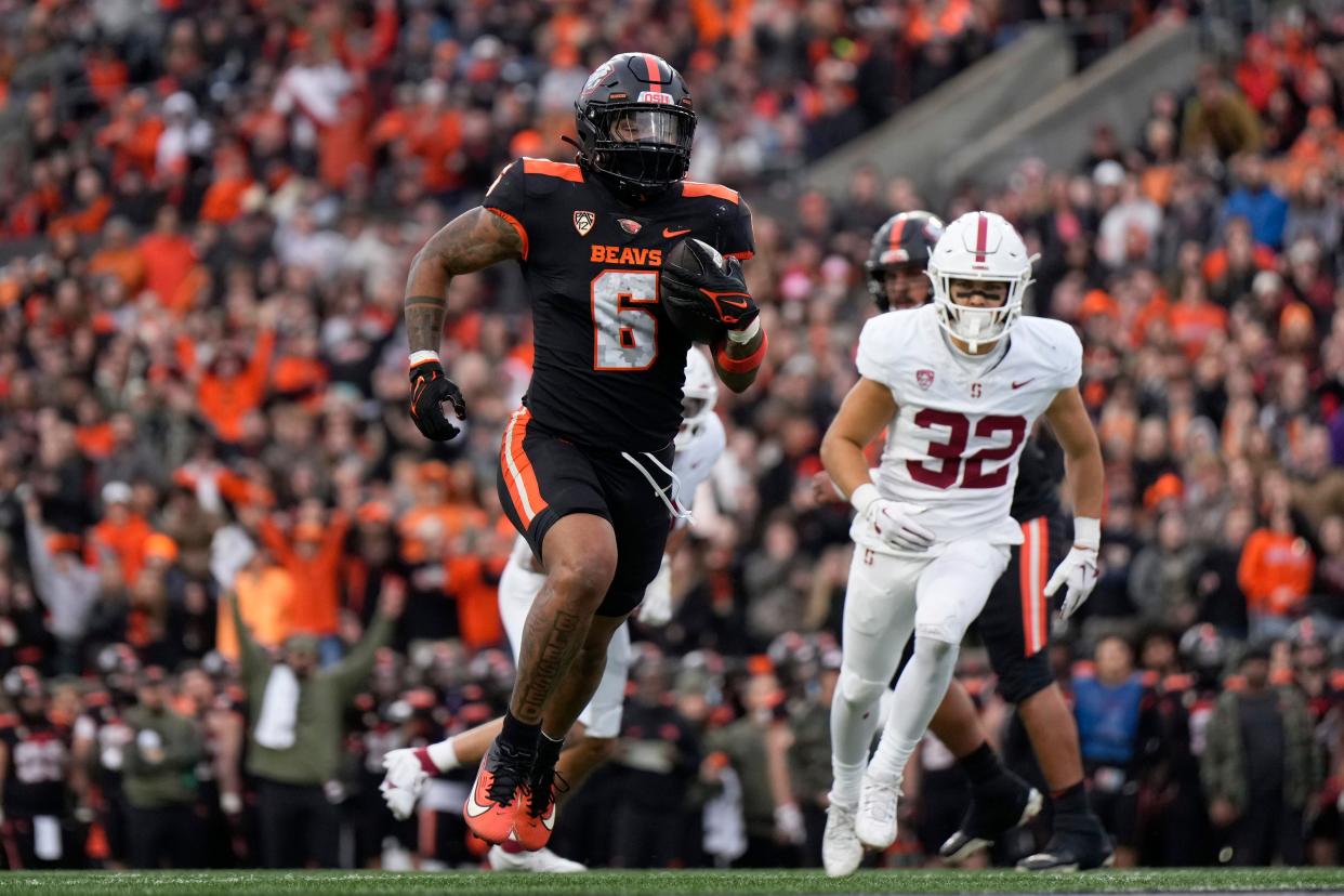 Oregon State running back Damien Martinez (6) runs with the ball for a touchdown during the first half against Stanford at Reser Stadium.