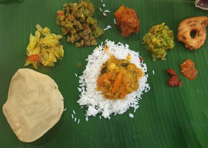 Some of the food that Melani will be cooking for the new year which include vadai, fried cabbage and sambar served on banana leaf. — Picture courtesy of Melani Hansika