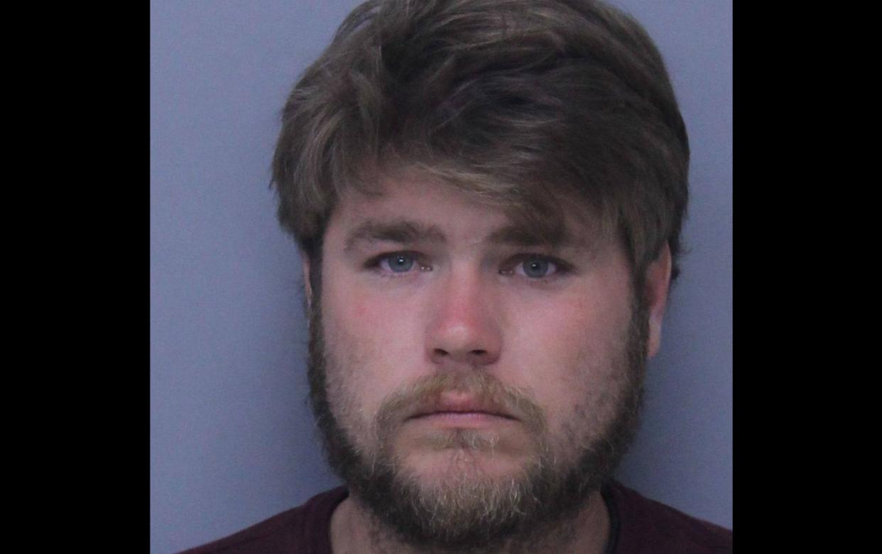 Christopher Griffis, 31, was arrested and charged with four counts of child neglect after leaving a 10-year-old in a parking lot alone for 15 minutes because the child allegedly threw up in the car. (Photo: St. Johns County Sheriff's Office)