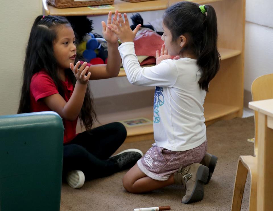 Preschoolers Exayana Bedolla, left, and Vanessa Serrano play at El Hogar del Niño, a Head Start center on South Loomis Street in Chicago on Thursday, Aug. 15, 2019.