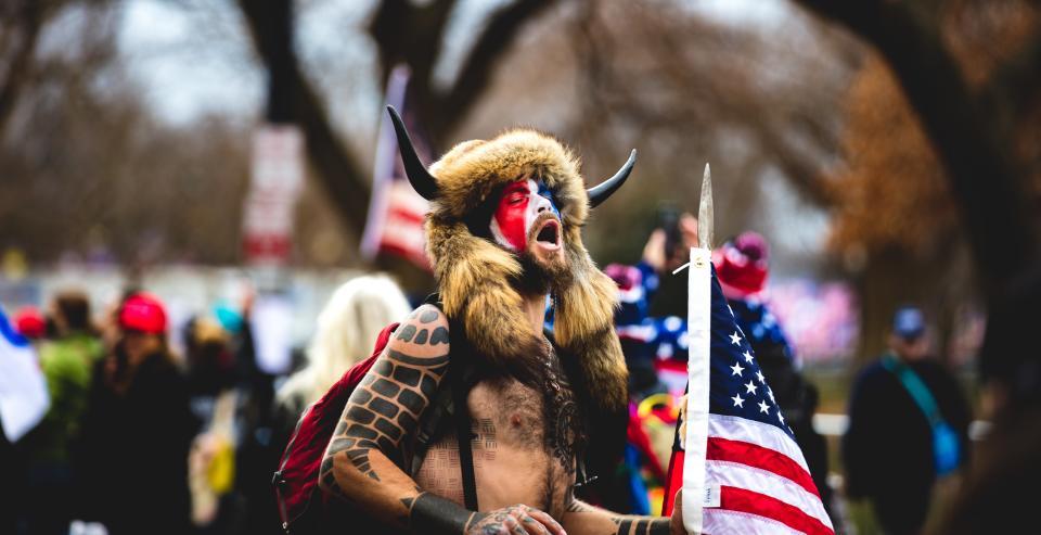 The ‘Q Sharman’ wearing Nordic attire at the Capitol Riot (Shutterstock / Johnny Silvercloud)