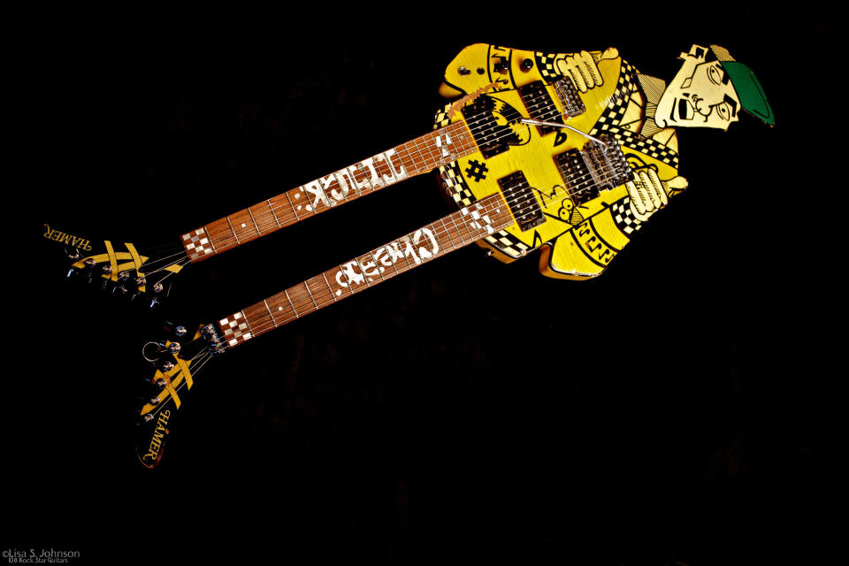 This May 5, 2011 photo provided by Lisa S. Johnson shows a double-neck guitar named “Uncle Dick,” owned by Rick Nielsen of the group Cheap Trick. It appears in Johnson’s new book, “108 Rock Star Guitars,” which celebrates instruments owned by celebrities and virtuoso sidemen as a form of visual art. (AP Photo/Lisa S. Johnson)