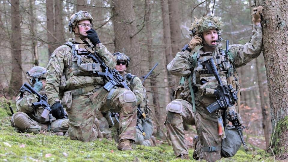 U.S. Army Soldiers with the 2nd Cavalry Regiment are pictured during Dragoon Ready 2023. They are using integrated tactical network capabilities, which include radios. (Sgt. Rebecca Call/U.S. Army)