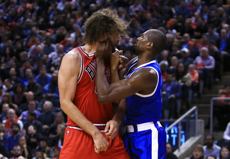 <p>The Raptors made a splash ahead of the NBA trade deadline, acquiring Serge Ibaka from the Magic on Feb. 14. The big man didn’t take long to make his presence felt, throwing punches with Chicago’s Robin Lopez during a game in March. (Photo by Vaughn Ridley/Getty Images) </p>