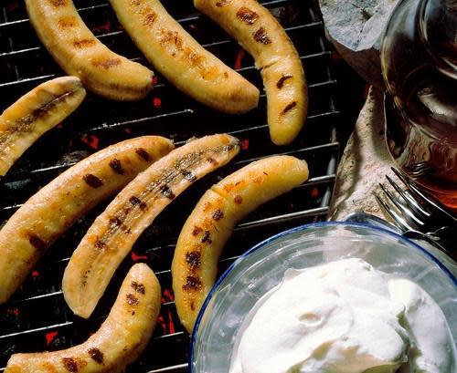 bananas on the grill with whipped cream