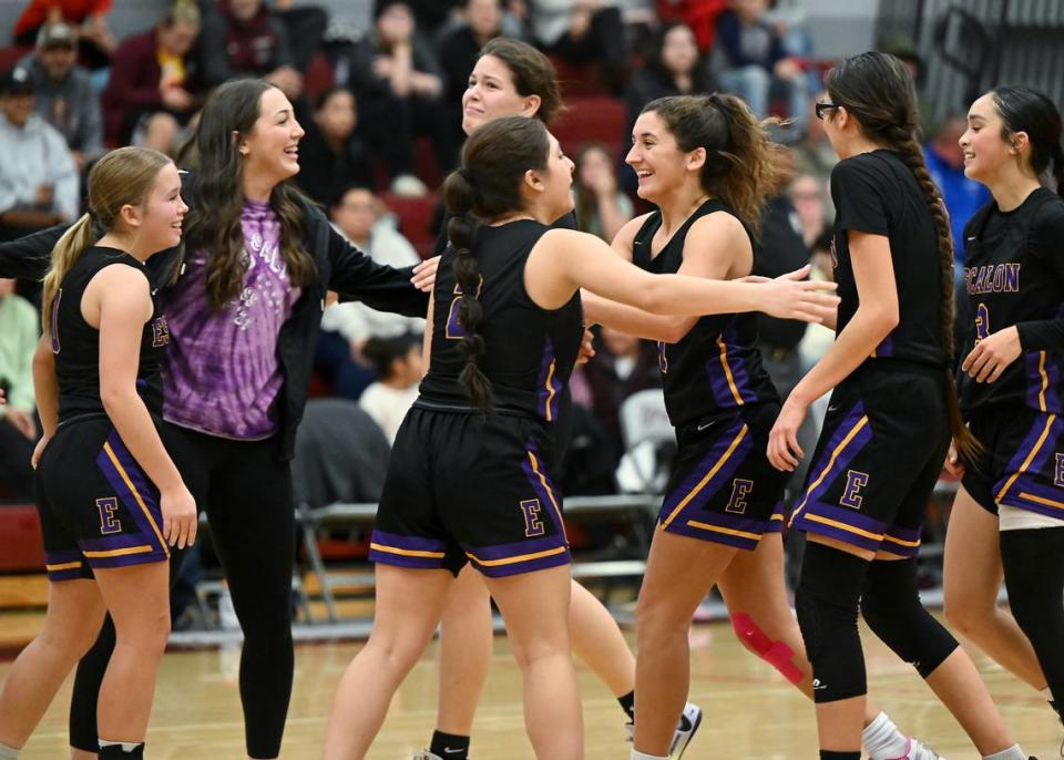 Escalon team members celebrate their 52-51 victory over Riverbank in the Trans Valley League game at Riverbank High School in Riverbank, Calif.,Thursday, Jan. 4, 2024. Andy Alfaro/aalfaro@modbee.com