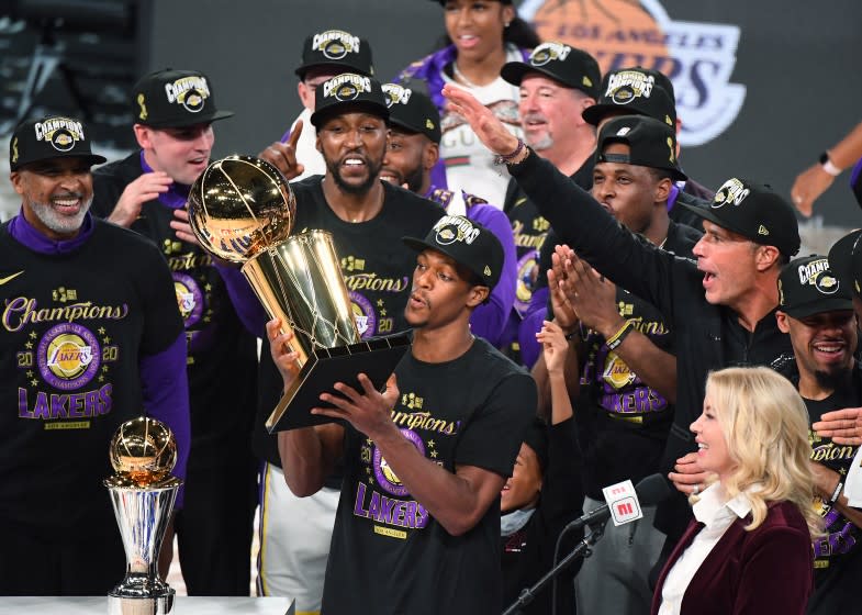 ORLANDO, FLORIDA OCTOBER 11, 2020-Lakers Rajon Rondo takes the trophy.