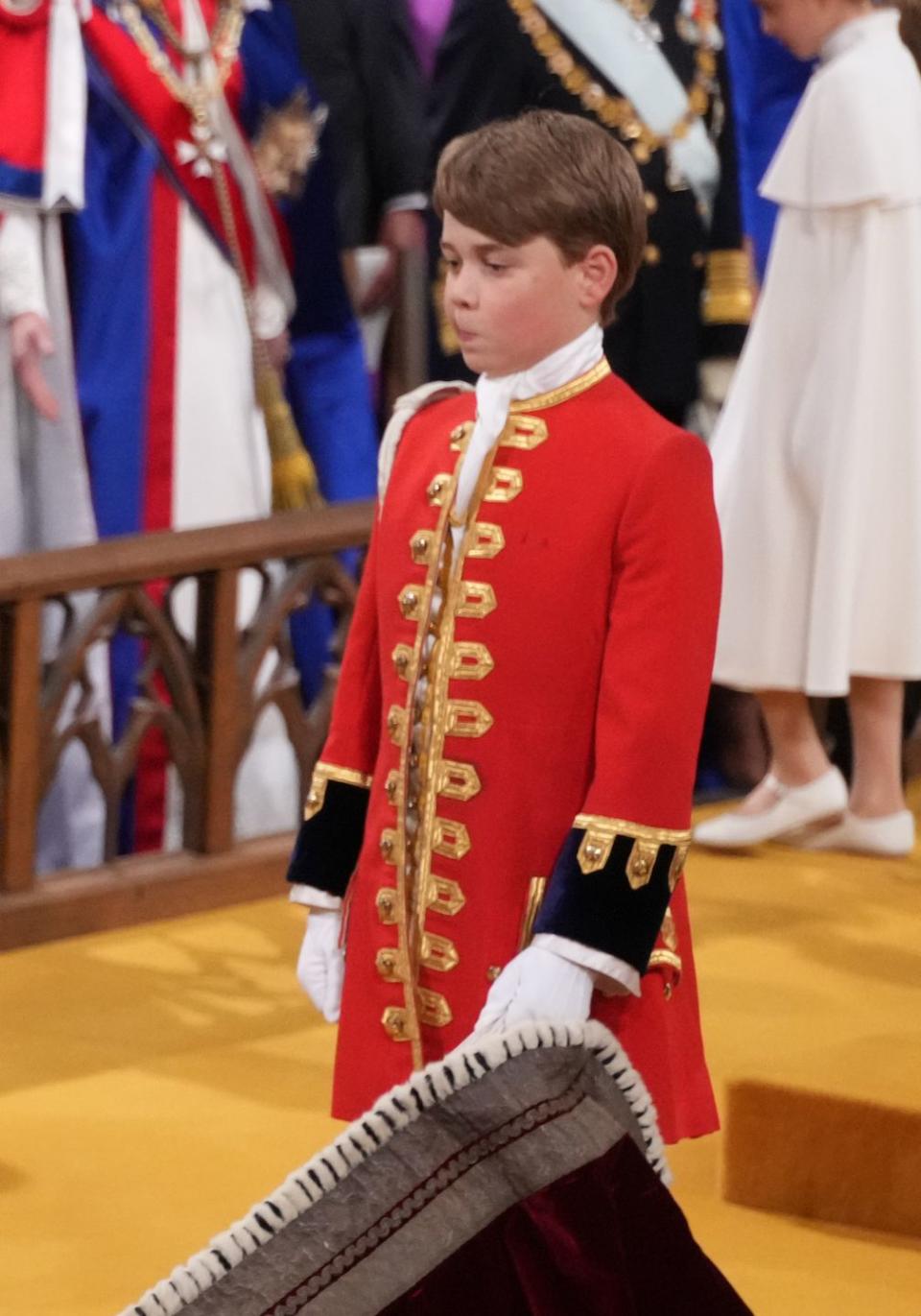 london, england may 06 prince george as page of honour at the coronation ceremony of king charles iii and queen camilla in westminster abbey, on may 6, 2023 in london, england the coronation of charles iii and his wife, camilla, as king and queen of the united kingdom of great britain and northern ireland, and the other commonwealth realms takes place at westminster abbey today charles acceded to the throne on 8 september 2022, upon the death of his mother, elizabeth ii photo by victoria jones wpa poolgetty images