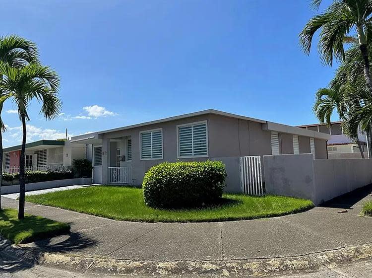In Levittown, Puerto Rico, this house on Calle Mirella is the only Levitt-built house listed for sale on Zillow for $195,000, palm trees and year-found tropical weather included.