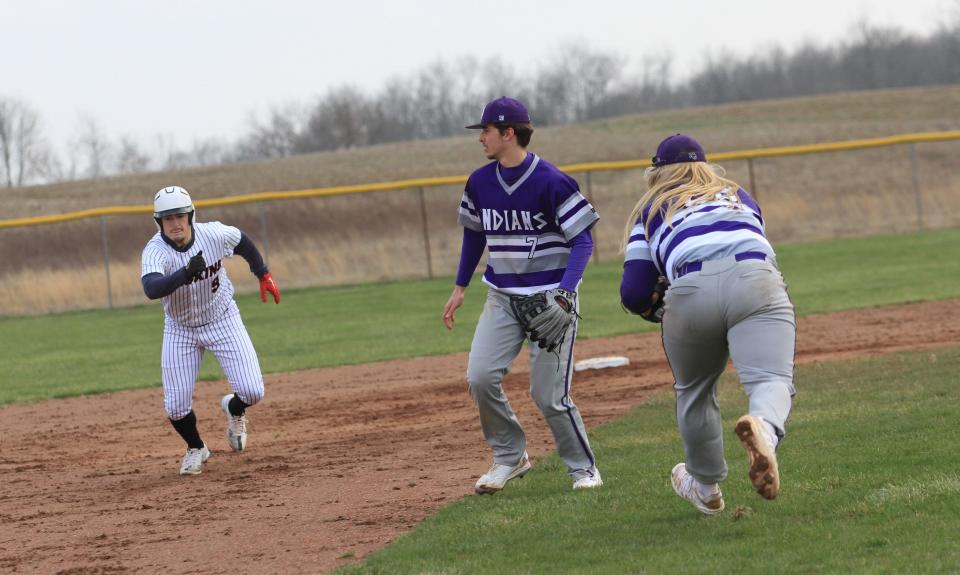 Mount Gilead tries to make a play in the infield during a game at Utica to open the season this week in baseball.
