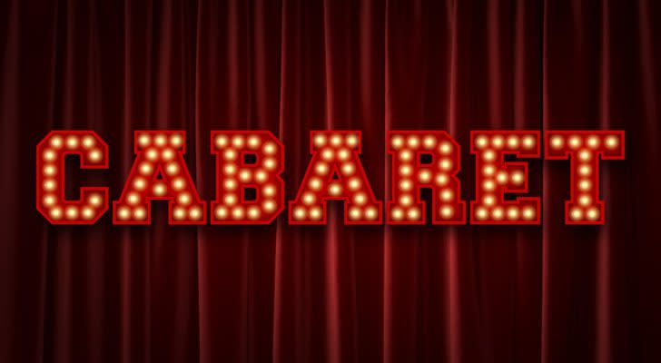 the word cabaret displayed upon a red curtain