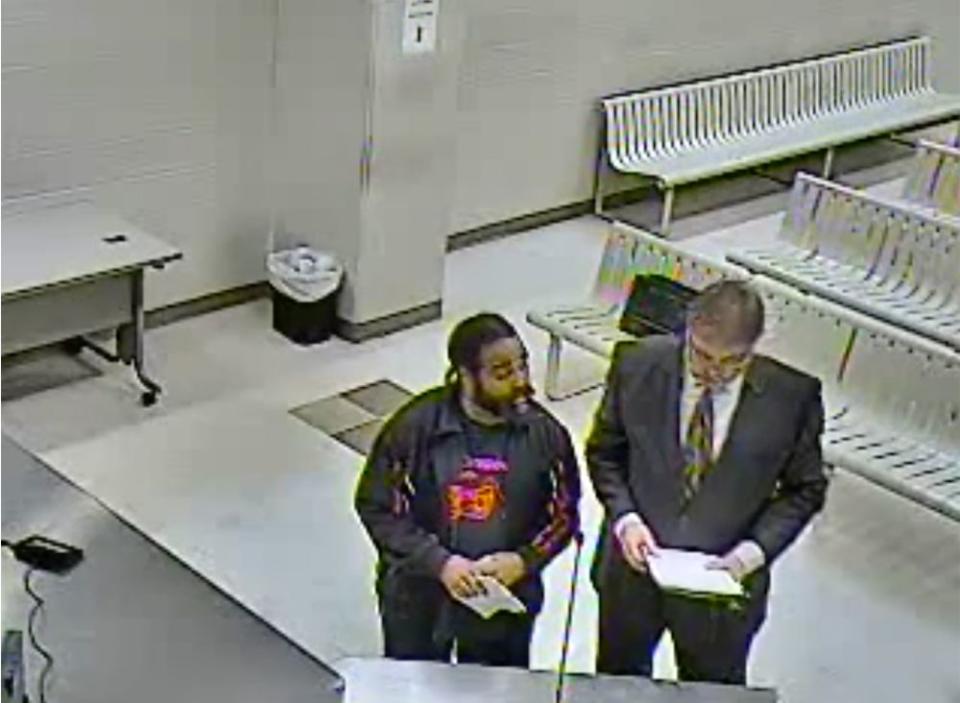 Nathan Sutherland, at left, in court Jan. 23, 2019