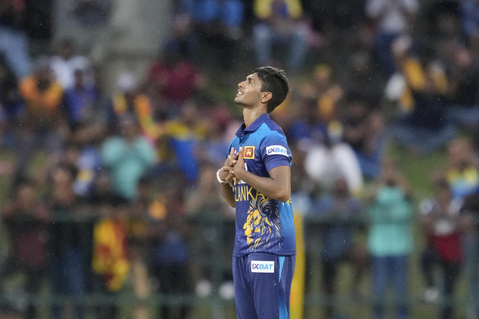 Sri Lanka's Matheesha Pathirana looks skywards as he celebrates taking the wicket of Bangladeshes' Mushfiqur Rahim during the one day international cricket match between Sri Lanka and Bangladesh of Asia Cup in Pallekele, Sri Lanka on Thursday, Aug. 31. (AP Photo/Eranga Jayawardena)