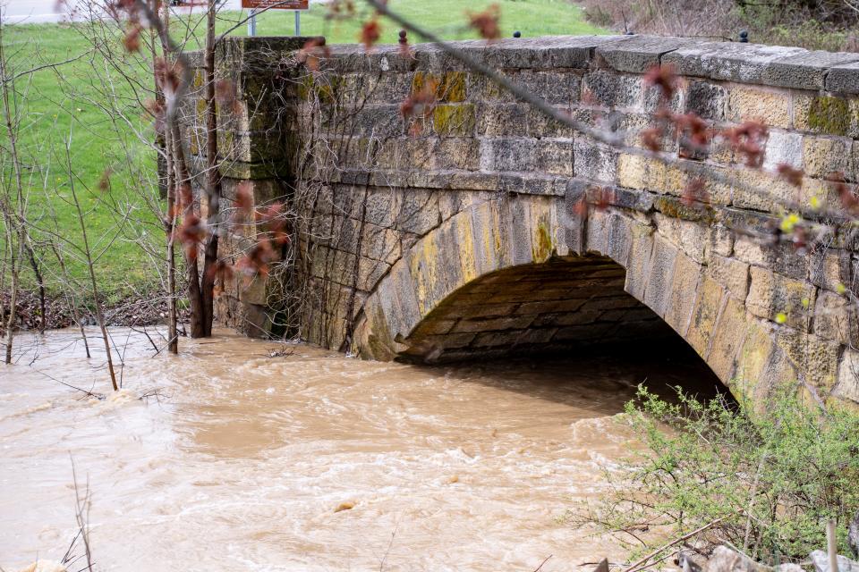 Peters Creek rushes under the S Bridge off of Route 40 on Tuesday.