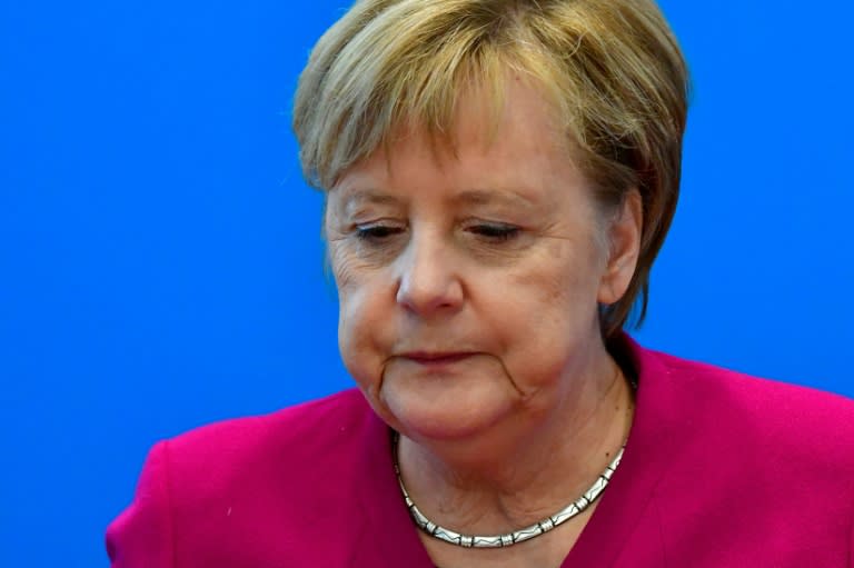 German Chancellor Angela Merkel has headed the CDU for 18 years