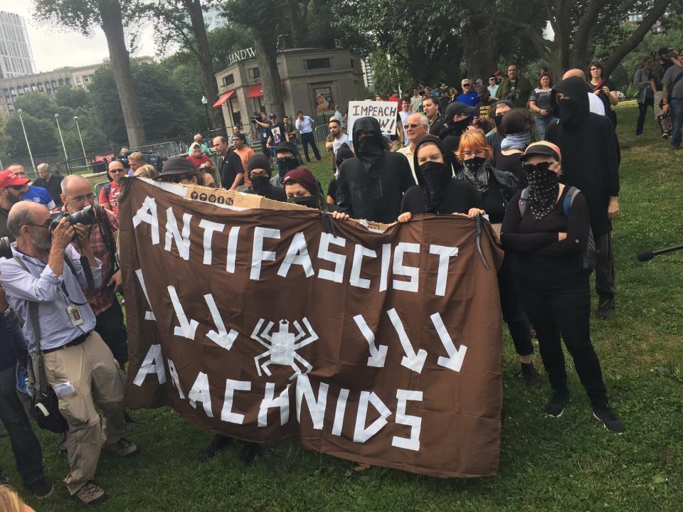 Antifa protesters wait on Boston Common.