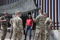 South Dakota Gov. Kristi Noem visits the U.S. border with Mexico on Monday, July 26, 2021, near McAllen, Texas. The Republican governor deployed roughly 50 National Guard troops to help with Texas’ push to arrest people crossing illegally and charge them with state crimes. (AP Photo/Stephen Groves)