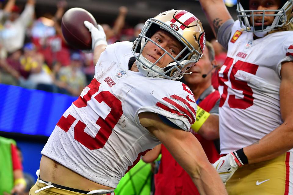 San Francisco 49ers running back Christian McCaffrey (23) celebrates a touchdown against the Los Angeles Rams.