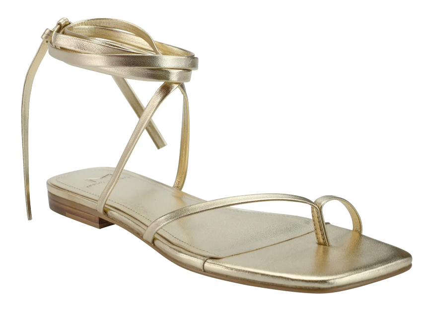 Gold strappy sandal. 