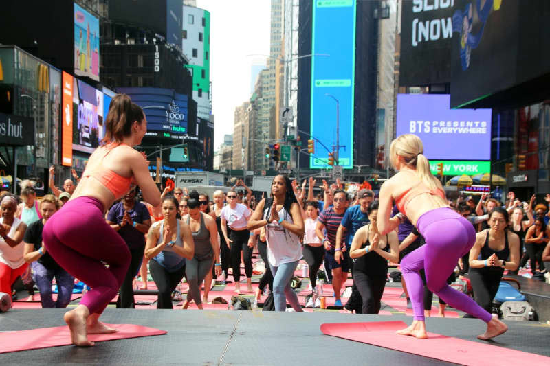 For more than two decades, people have been marking World Yoga Day in June with a mass event on Times Square. Christina Horsten/dpa