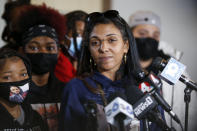 Tamala Payne, mother of Casey Goodson Jr., answers questions during a news conference Thursday, Dec. 2, 2021, in Columbus, Ohio about the indictment of a former deputy who shot and killed her son. Jason Mead, the Ohio sheriff's deputy who fatally shot Casey Goodson Jr. in the back five times has been charged with murder and reckless homicide. (AP Photo/Jay LaPrete)