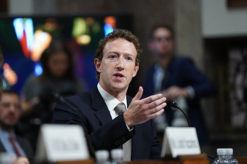 During a Senate hearing on social media on Wednesday, Meta CEO Mark Zuckerberg apologized to families who lost loved ones because of harm from social media harm. Photo by Bonnie Cash/UPI