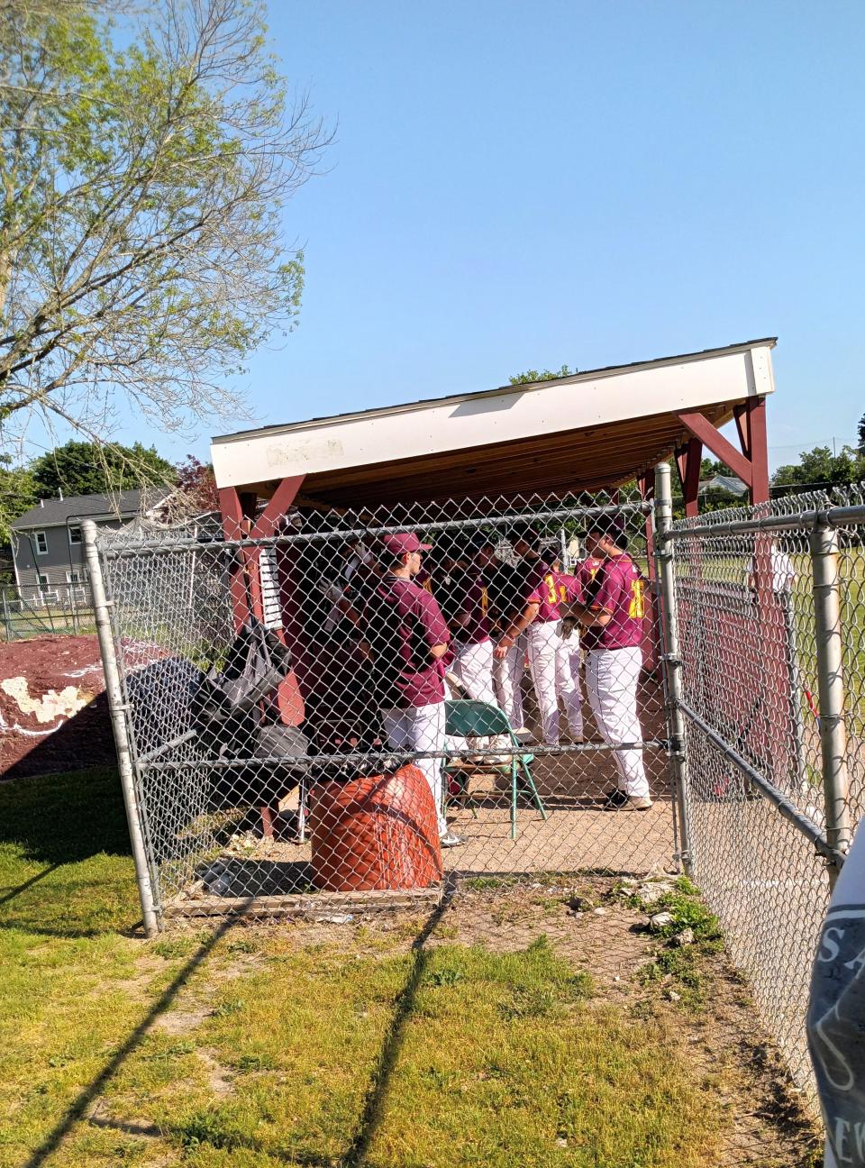 The Case baseball players pack up their stuff after Thursday's Division IV preliminary home game against Lynn Voc-Tech was postponed. The game will take place on Saturday at Durfee High School, beginning at noon.