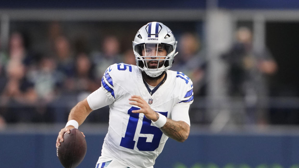 Dallas Cowboys quarterback Will Grier (15) runs the ball against the Seattle Seahawks during a preseason NFL football game, Saturday, Aug. 19, 2023, in Seattle. (AP Photo/Lindsey Wasson)