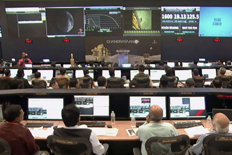 Indian Space Research Organization scientists wait for the landing of spacecraft Chandrayaan-3 on the moon on Wednesday. There is significant scientific interest in the south pole because researchers believe it may contain frozen ice, which could be used as drinking water and help make fuel and oxygen allowing for life to be sustained there. Photo by Indian Space Research Organization