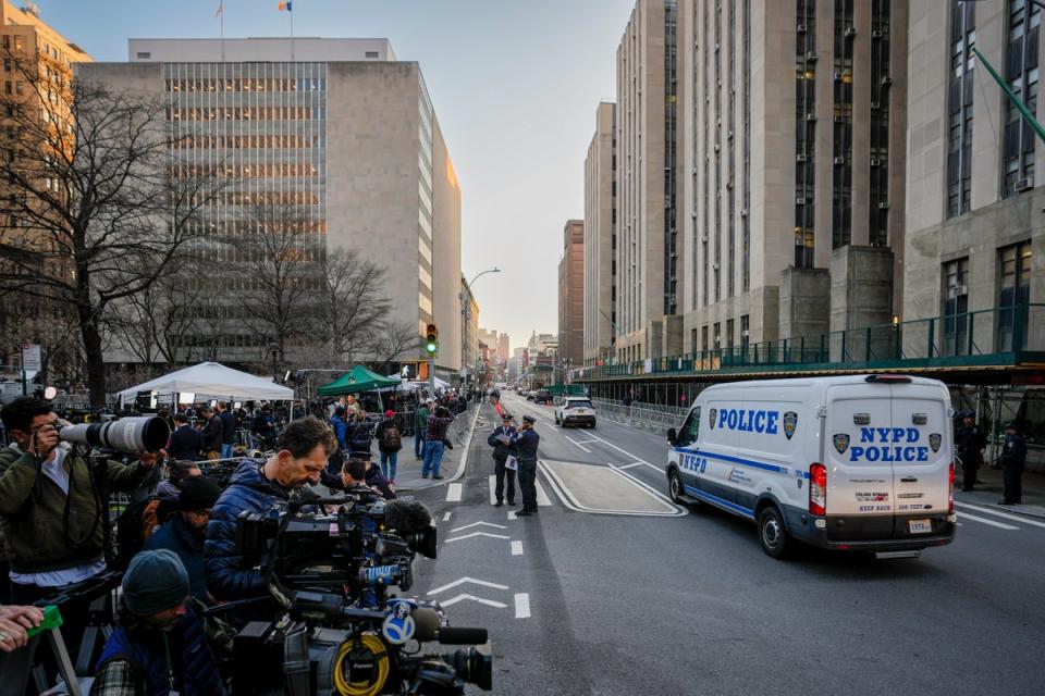 Journalists gather at the Manhattan Criminal Court on Tuesday morning (Associated Press)